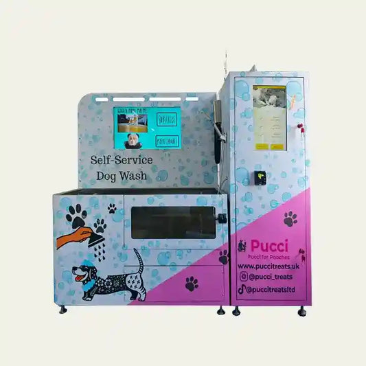 Self-service dog wash machine with colorful paw print design and digital display for pet grooming